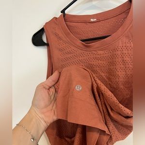 Woman’s lulu lemon tank top. Perforated wicking material. Not altered.